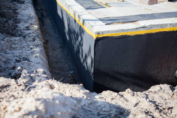Professional Waterproofing technician working in Rochelle, VA